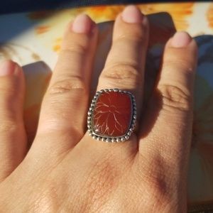SS and carnelian ring with flower carving